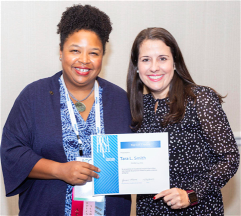 ​Tara Smith, left, recently received the GIFT Award from the PRSA Educators Academy. ​