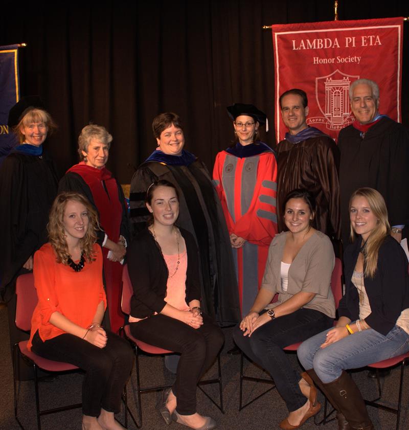Students and faculty attend the Lambda Pi Eta Induction Ceremony