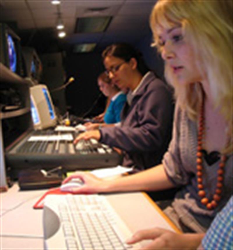 Students work in the control room of UD's student television studio located In Pearson Hall.